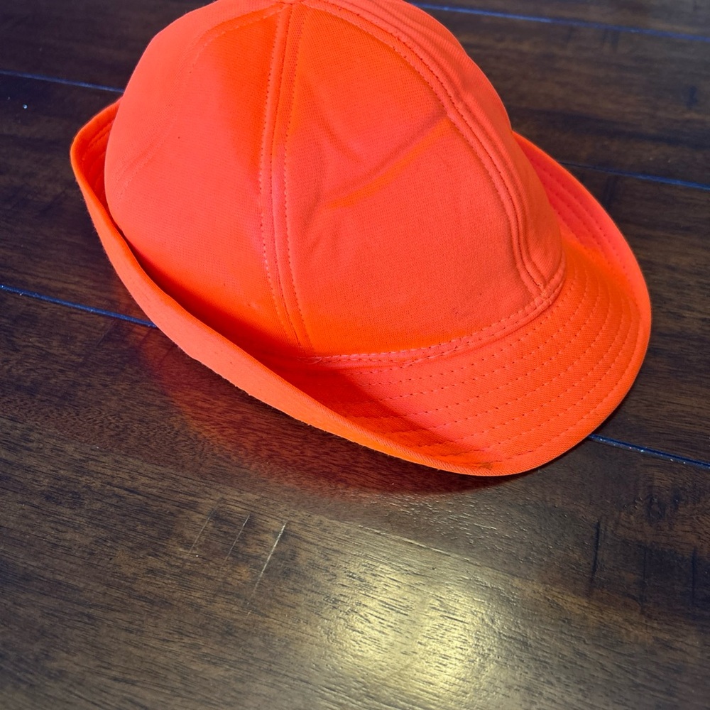 Vintage blaze orange hunting hat. Bucket style with ear flaps.
